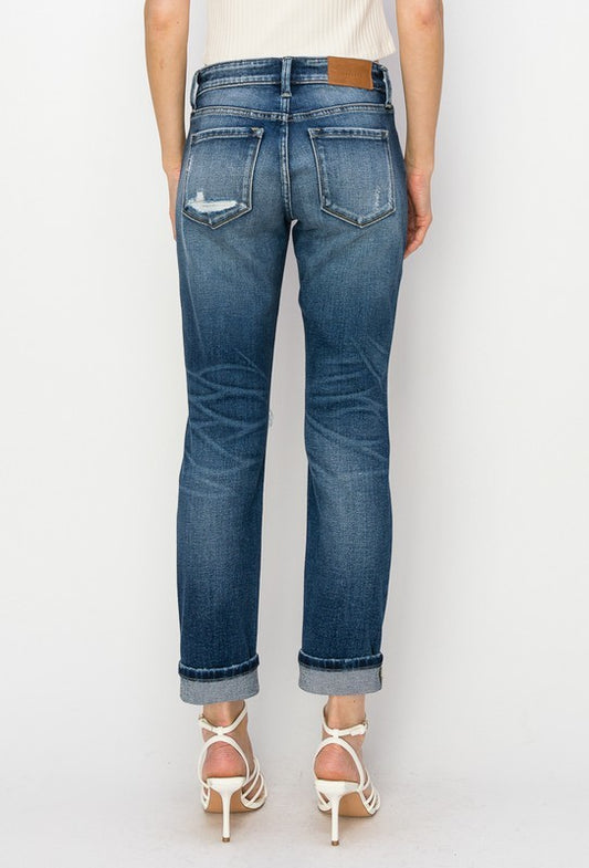 Relaxed fit boyfriend jeans with trendy distressed details for casual style.
