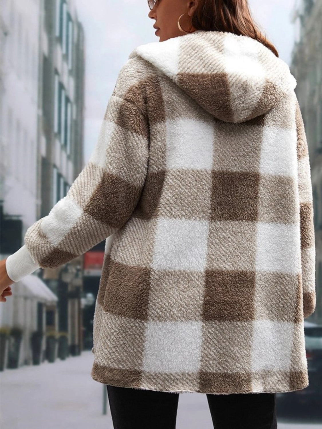 Relaxed fit plaid jacket with hood, ideal for layering in cold weather
