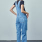 Full-length ripped denim overalls with a structured, relaxed silhouette.
