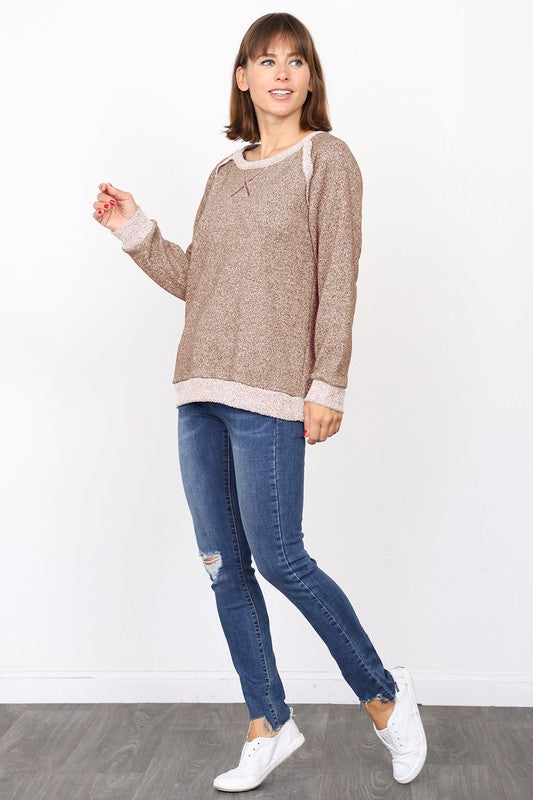 Soft tan French terry top with shimmer details, perfect for fall style.
