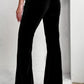 Stylish black pants with flared bottoms, ideal for casual or dressy outfits.
