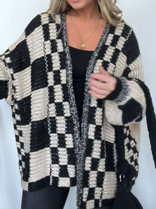 Retro-style black checkerboard cardigan with oversized fit
