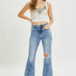 RISEN high-rise distressed flare jeans for a chic, edgy look