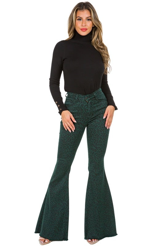 Stylish pine green leopard bell bottom jeans made from stretchy denim fabric.
