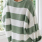 Classic sage and white striped sweater with a comfy, oversized feel.
