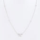 Sophisticated bow-shaped necklace with an adjustable chain and cubic zirconia accents