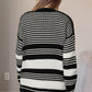 Black and white plaid cardigan featuring a relaxed fit and ribbed texture
