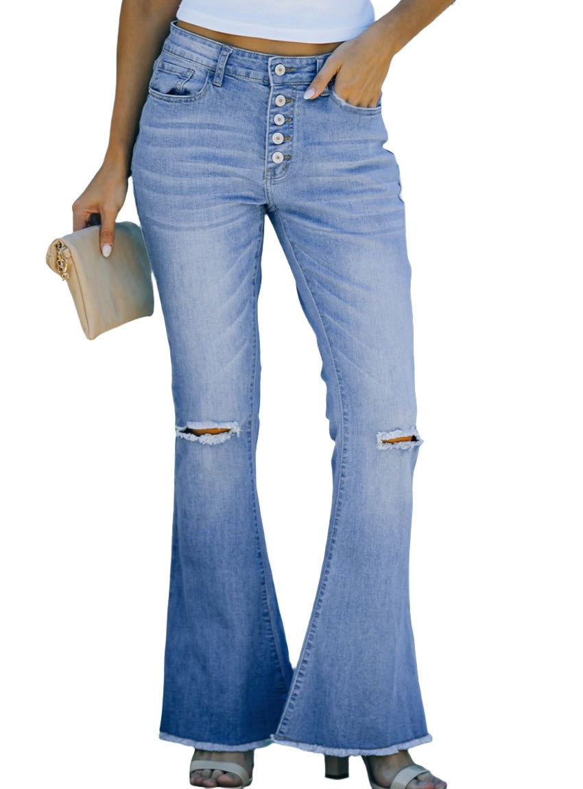 Front view of button-fly distressed raw hem flare jeans in light blue denim with knee distressing and a high waist.