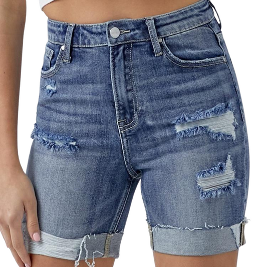 Comfort-focused RISEN distressed rolled denim shorts.