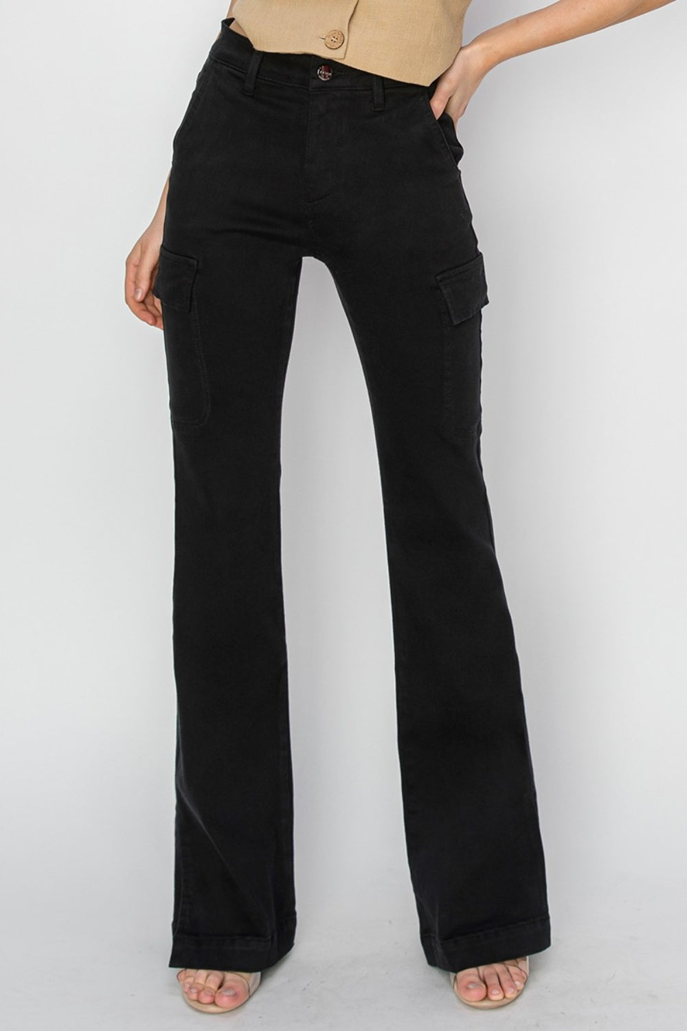 Black RISEN High Rise Bootcut Jeans with cargo pockets and side slit.