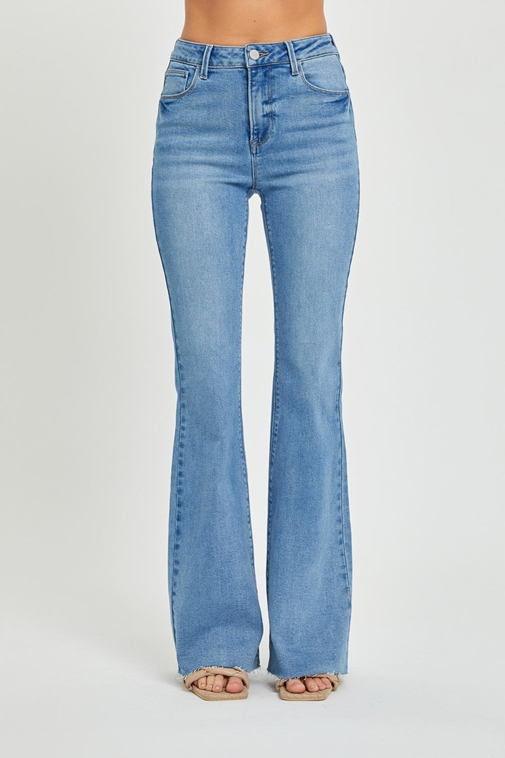 RISEN High Rise Bootcut Jeans with trendy light wash denim.