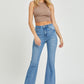 Casual styling with RISEN High Rise Bootcut Jeans and crop top.