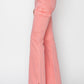 RISEN High Rise Side Slit Cargo Bootcut Jeans in Pink displayed on a model