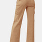 Back view of RISEN high rise wide leg cargo jeans featuring a relaxed wide-leg fit.
