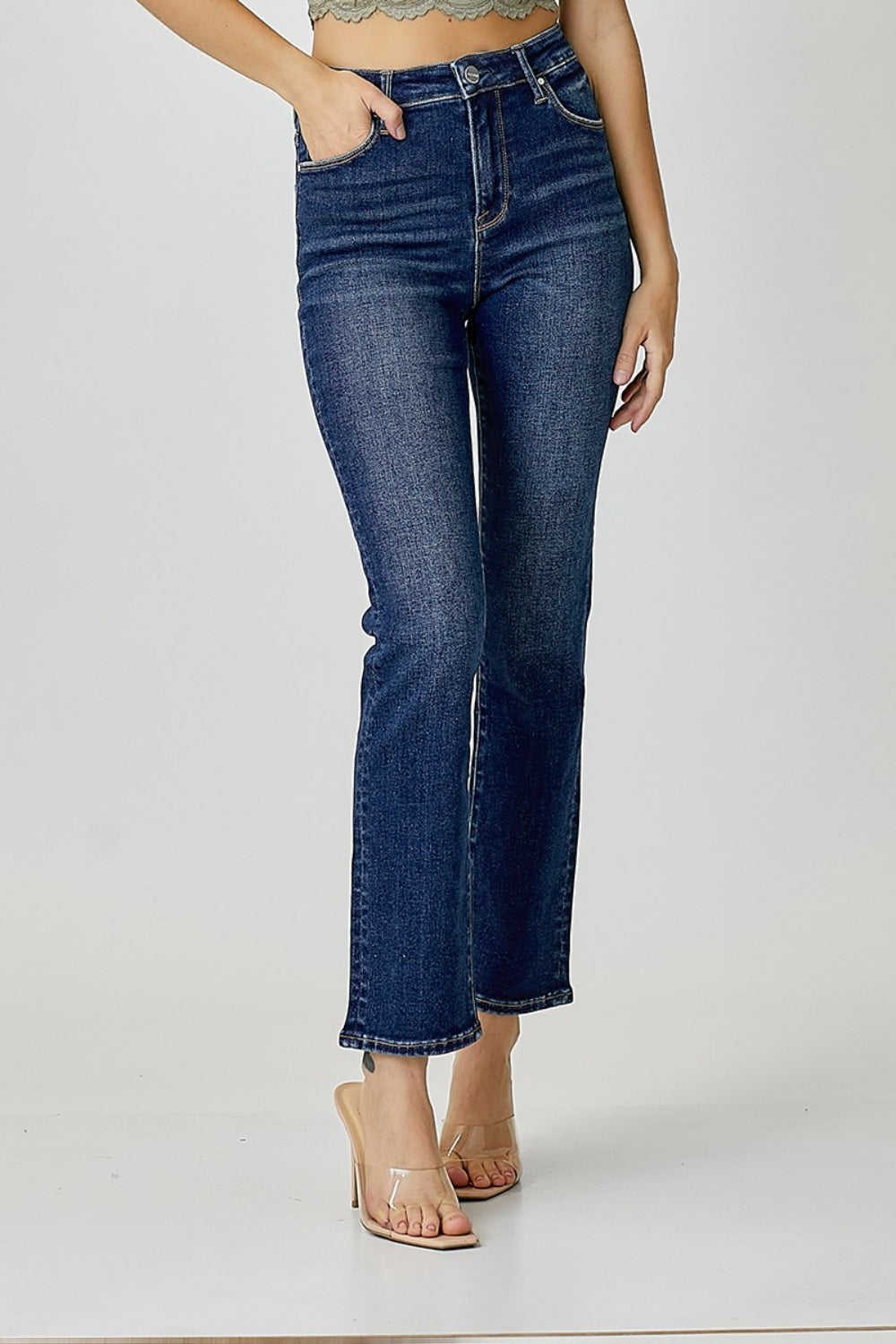 RISEN High Waist Straight Jeans paired with a trendy top for a stylish look.