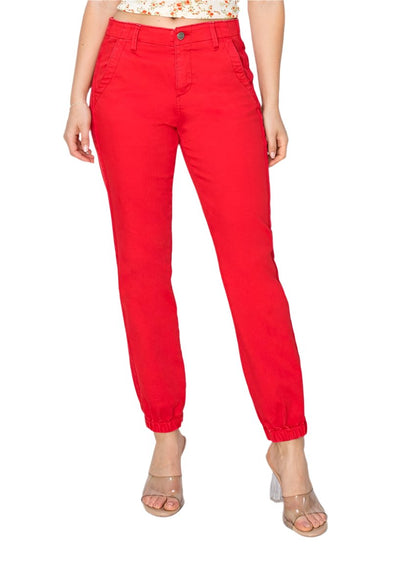 Front view of RISEN High Waisted Jogger Jeans in red with a high-rise fit and tapered legs.
