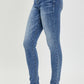 Side view of RISEN Mid Rise Ankle Skinny Jeans, illustrating the flattering silhouette.