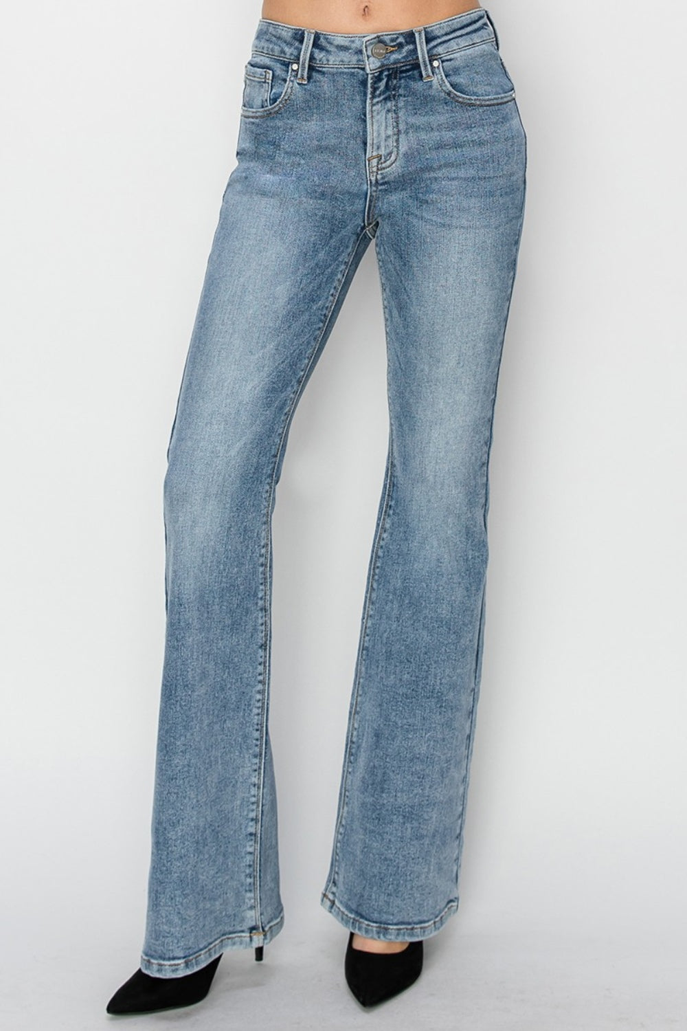 Mid-waist detail of RISEN Mid Rise Bootcut Jeans, showing the comfortable fit.