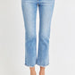 Trendy low rise jeans styled with a raw hem finish.
