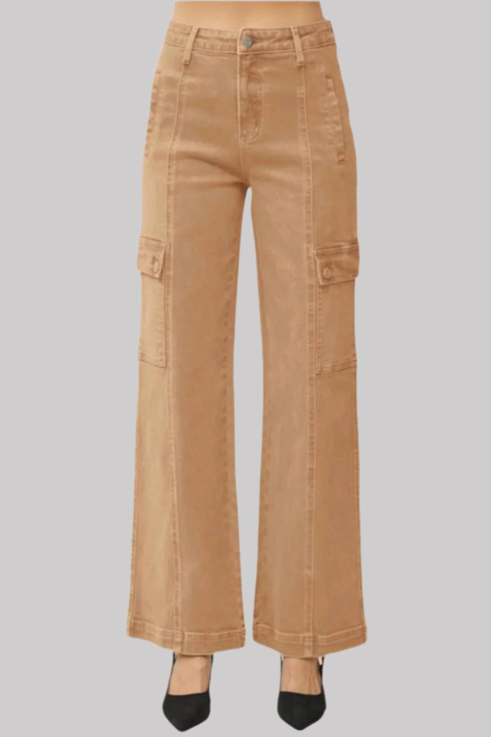 RISEN wide-leg cargo jeans in camel paired with black heels for a trendy look.
