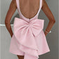 Romantic pink A-line dress with pearl trim, perfect for weddings

