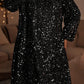 Plus-size black sequin dress styled for a party-ready look
