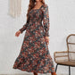 Romantic long sleeve floral dress styled with statement earrings and boots.
