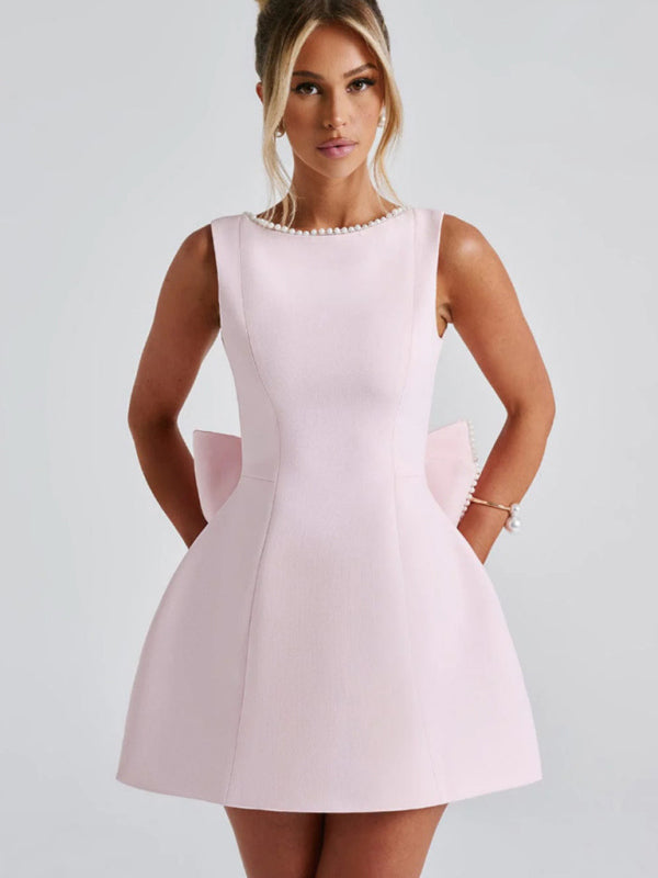 Beautiful pink dress for special occasions with pearl trim

