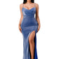 Front view of a royal blue mermaid gown with a side slit and spaghetti straps.
