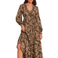 Front view of ruched printed V-neck midi dress with lace detailing and long sleeves.
