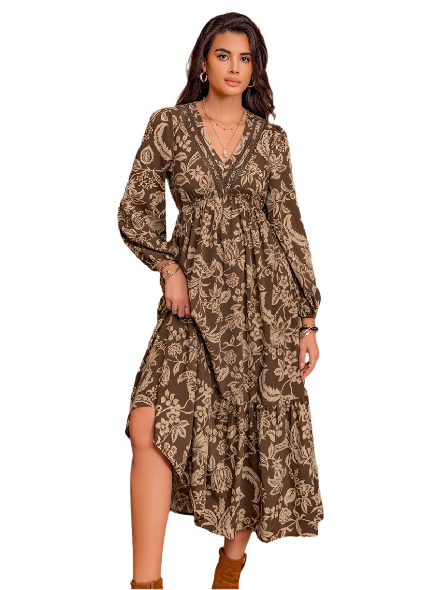 Front view of ruched printed V-neck midi dress with lace detailing and long sleeves.
