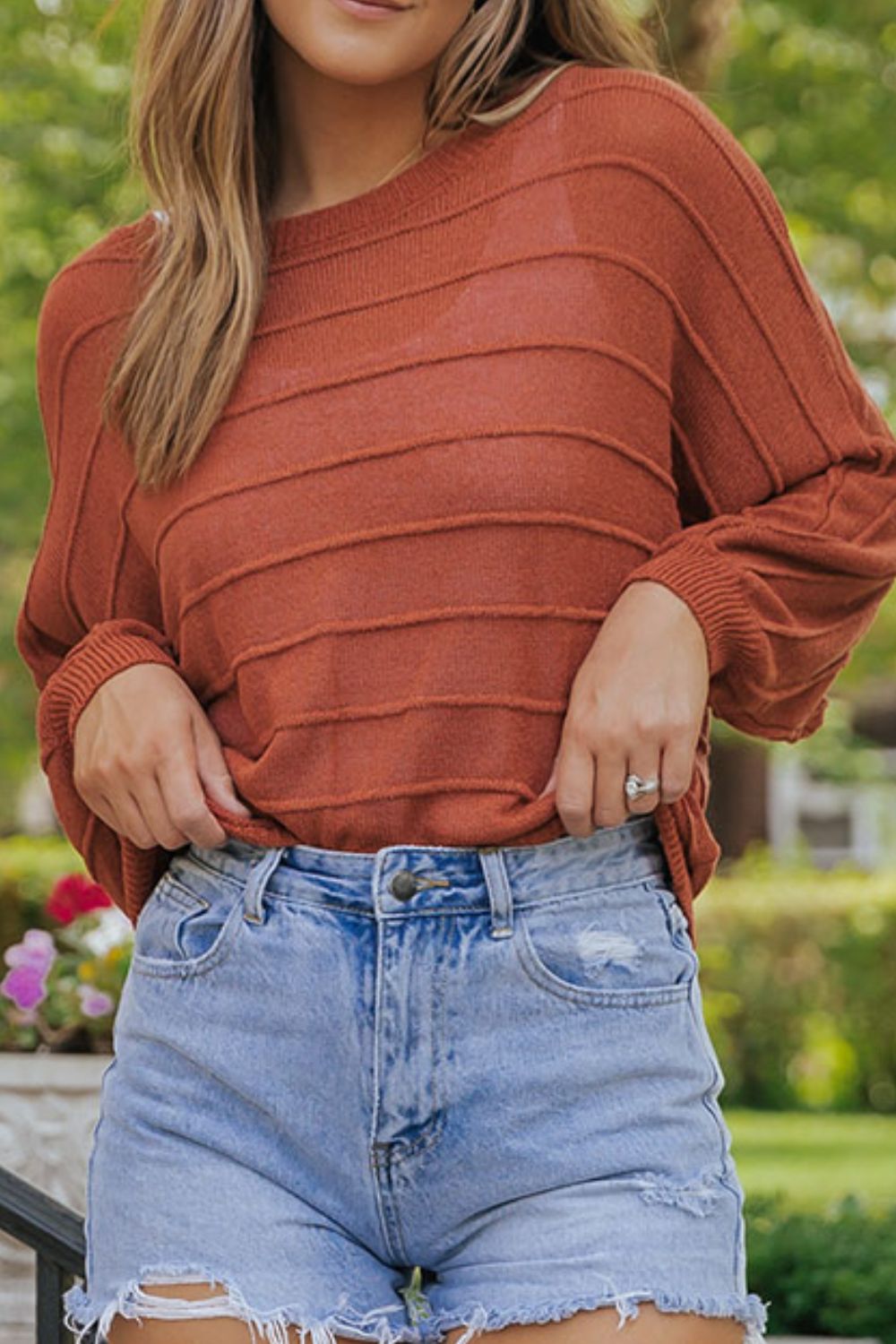 Cozy rust knitwear for everyday style
