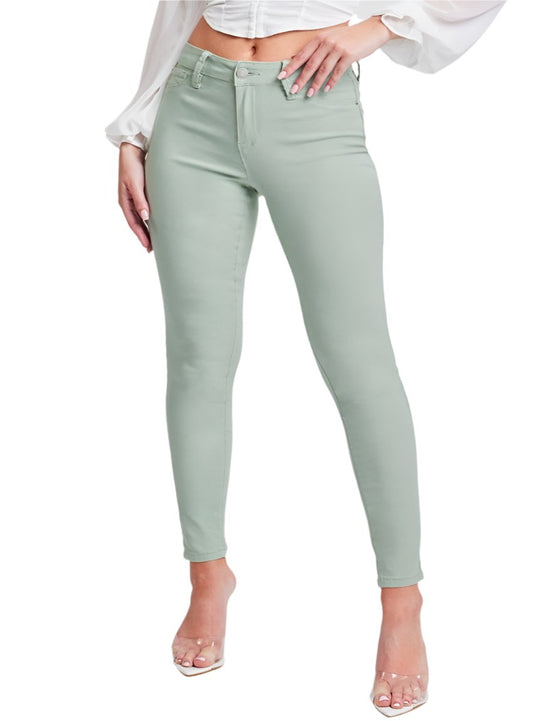 Soft sage green skinny jeans in a comfortable fabric.