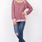 Burgundy shimmer terry top with a relaxed fit, ideal for cozy days.
