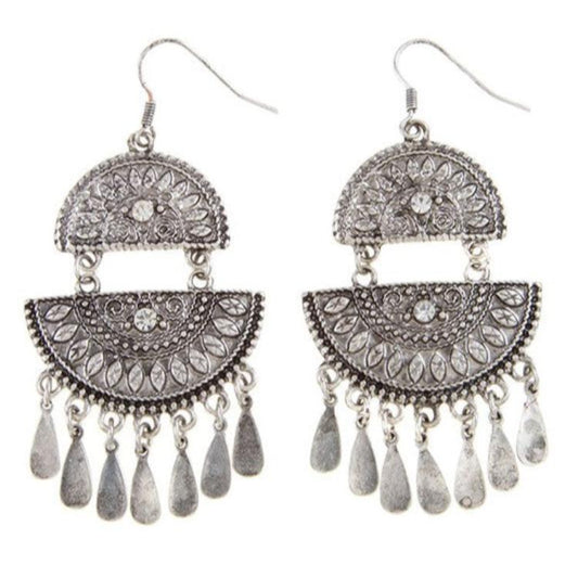 Silver bohemian dangle earrings with intricate patterns and delicate drop accents