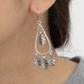 Silver-plated dangling leaf earrings perfect for adding a bohemian touch to your outfit.
