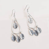 Silver Wind Swept Leaf Earrings with dangling leaves for a boho chic look.
