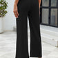 Women's black high-waisted trousers with wide-leg design for a chic look
