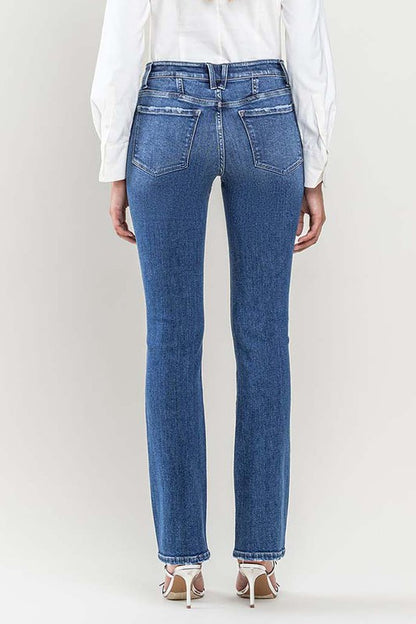 Women's slim bootcut denim jeans with a low-rise design.