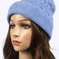 Classic blue cable knit beanie with relaxed slouchy style

