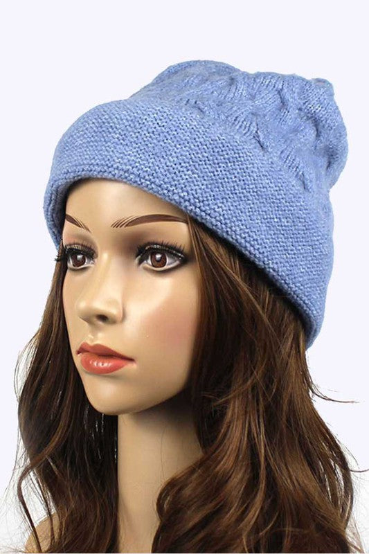 Classic blue cable knit beanie with relaxed slouchy style

