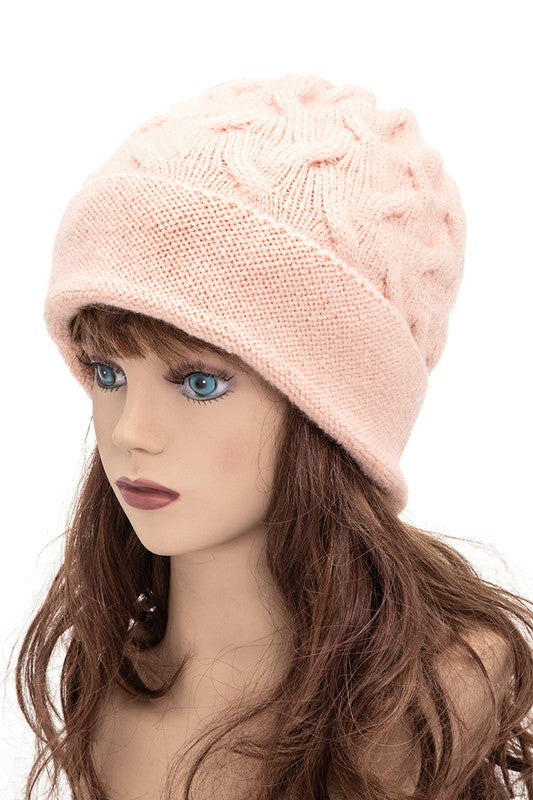 Classic blush cable knit beanie with relaxed slouchy style

