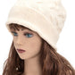 Classic ivory cable knit beanie with relaxed slouchy style

