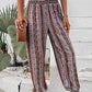 Smocked waistband striped boho pants for women, perfect for casual outings.