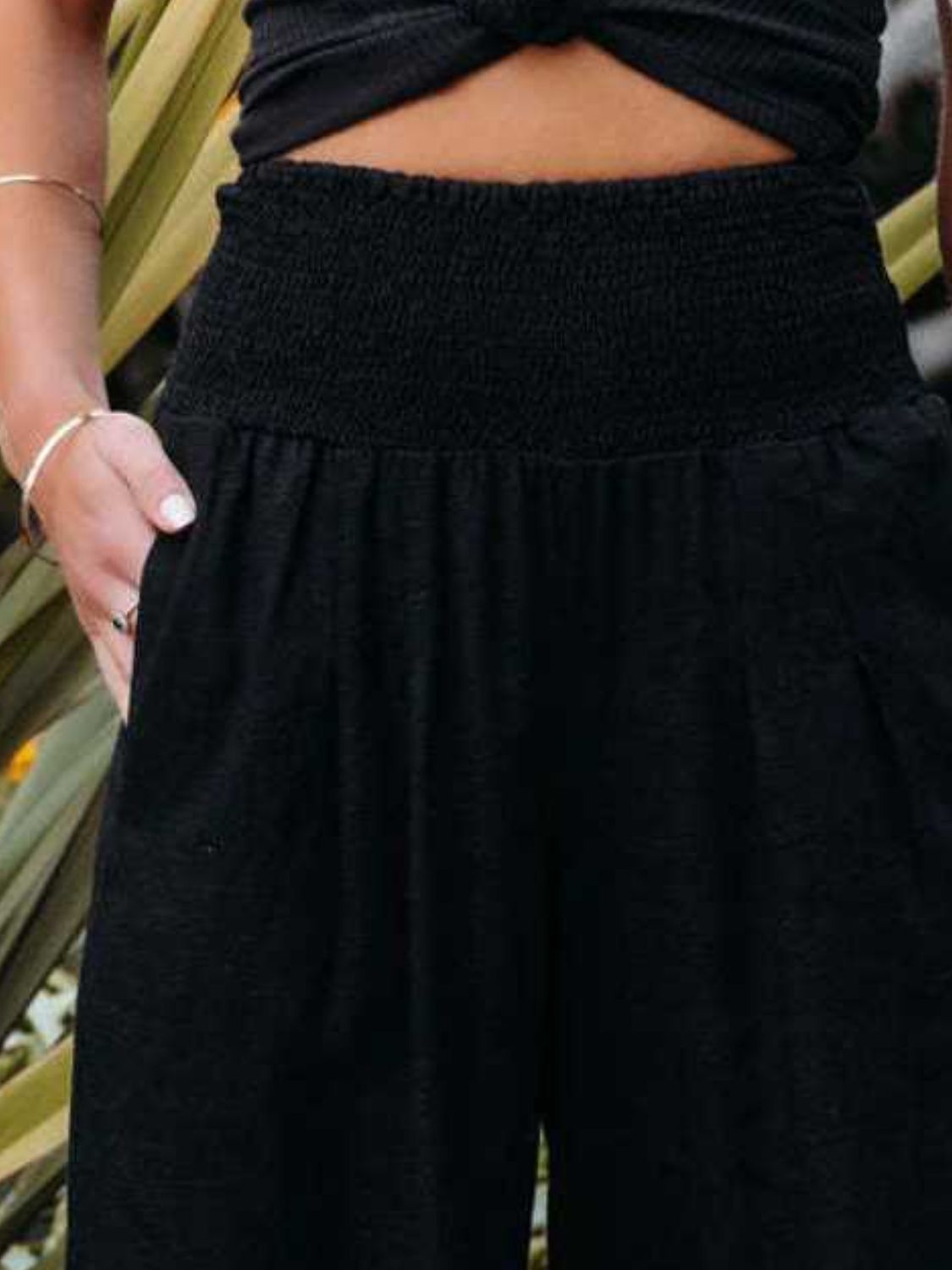 Women's black wide leg pants with a comfortable smocked waistband
