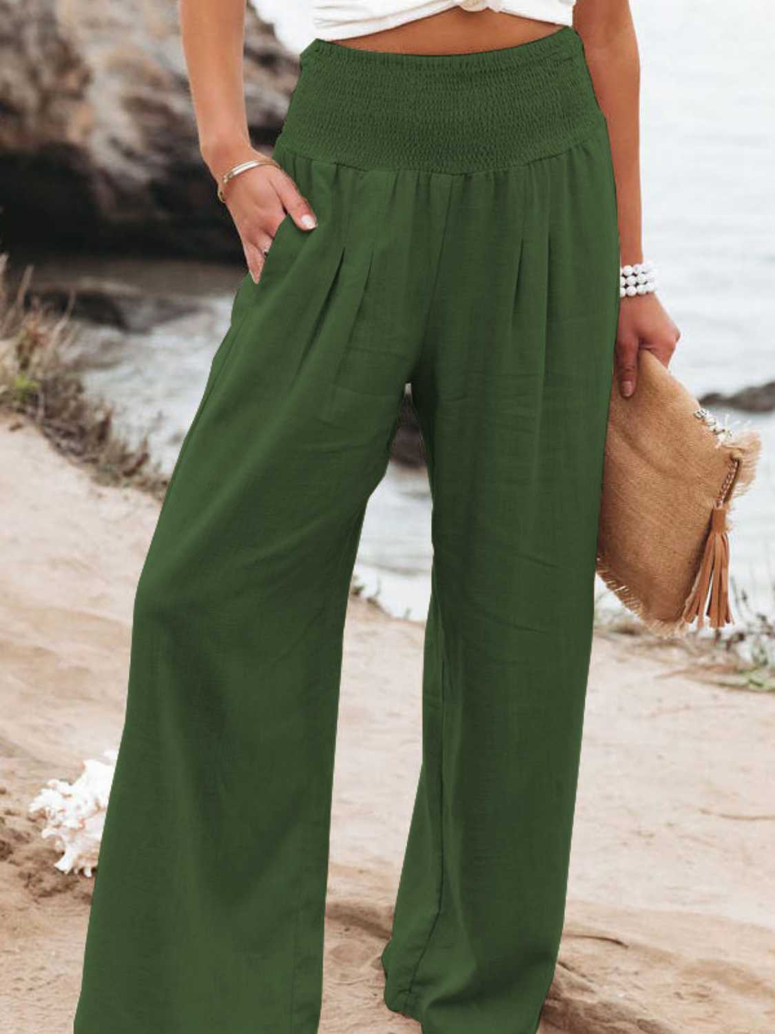 Women's green wide leg pants with a comfortable smocked waistband
