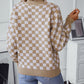 Soft camel checkerboard sweater with a classic V-neckline.
