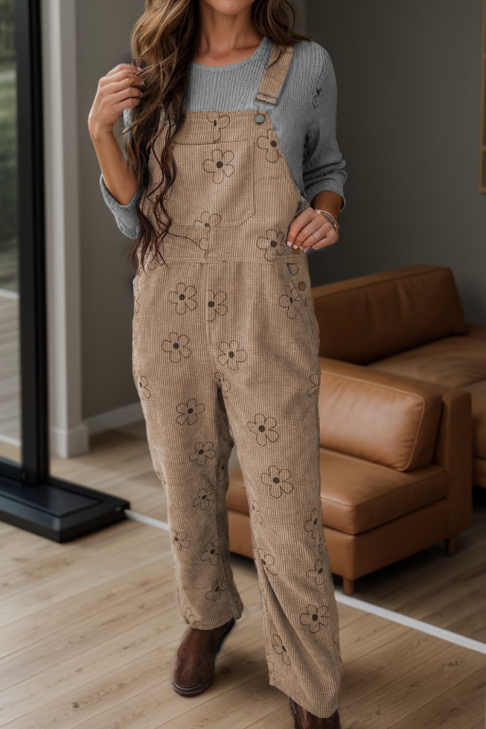 Comfortable wide-leg flower-patterned overalls for cozy fall styling.
