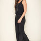 Comfortable black ruffle hem pants for a fun, trendy look
