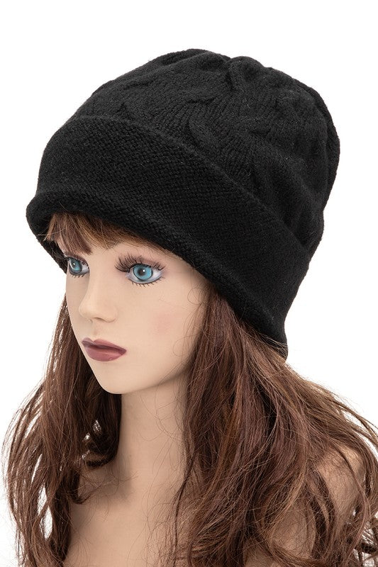 Comfortable black beanie featuring intricate cable pattern

